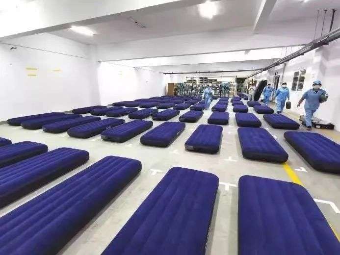 被卡住的汽车业:数千员工睡工厂,蔚小理推迟上新