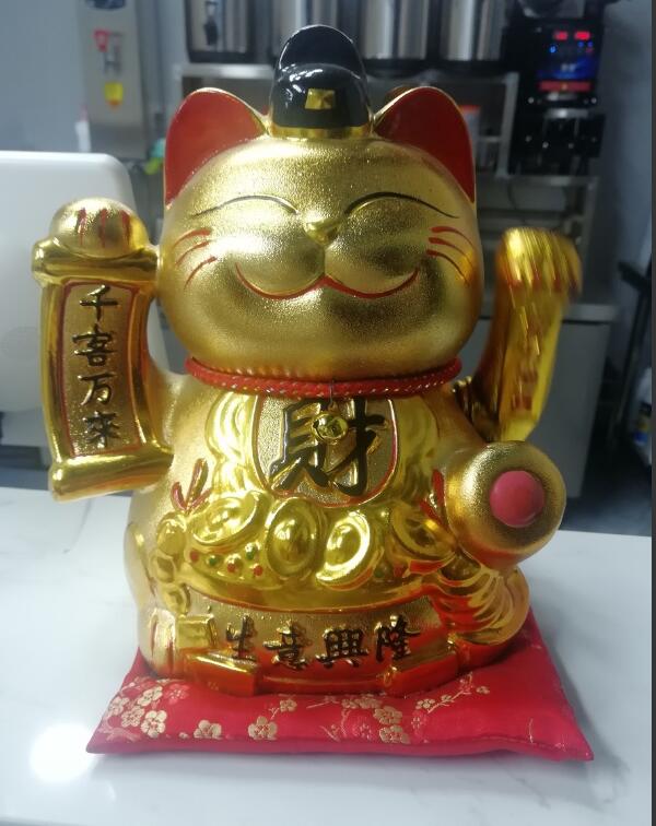 招财猫用什么供奉,招财猫供奉的注意事项